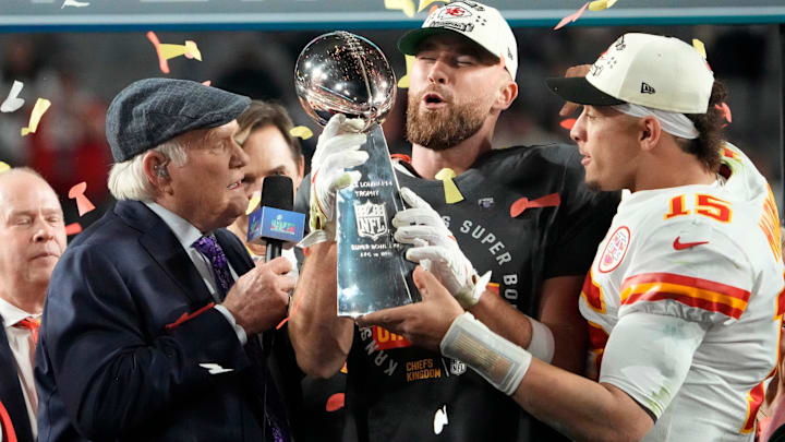 Super Bowl 57: Kansas City Chiefs quarterback Patrick Mahomes passes the the Lombardi Trophy to Travis Kelce after winning the Super Bowl against the Philadelphia Eagles at State Farm Stadium on Feb 12, 2023.