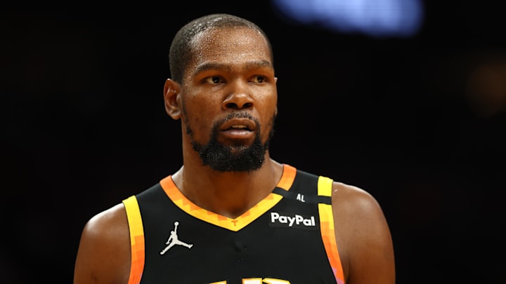 Dec 3, 2024; Phoenix, Arizona, USA; Phoenix Suns forward Kevin Durant (35) against the San Antonio Spurs in the first half of an NBA Cup game at Footprint Center.