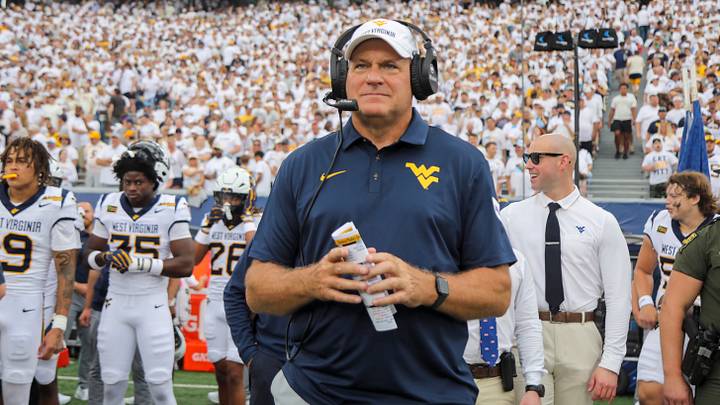Sep 5, 2026; Morgantown, West Virginia, USA; West Virginia Mountaineers head coach Rich Rodriguez walks the sidelines during the first quarter against the Coastal Carolina Chanticleers at Milan Puskar Stadium. Mandatory Credit: Ben Queen-Imagn Images Sep 5, 2026; Morgantown, West Virginia, USA; West Virginia Mountaineers head coach Rich Rodriguez walks the sidelines during the first quarter against the Coastal Carolina Chanticleers at Milan Puskar Stadium. Mandatory Credit: Ben Queen-Imagn Images