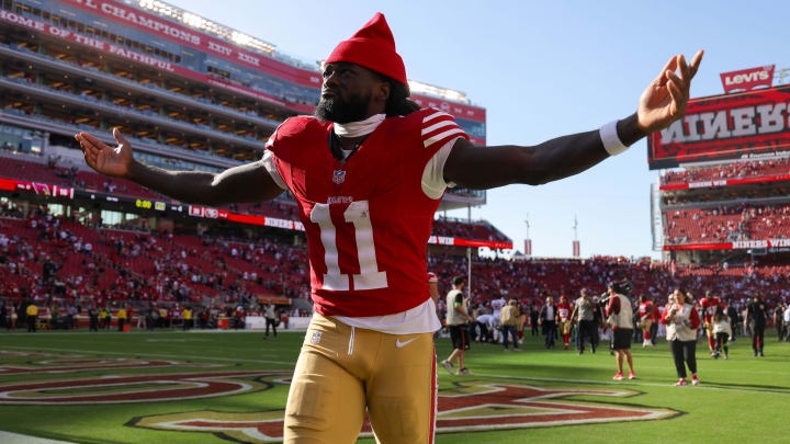 Oct 1, 2023; Santa Clara, California, USA; San Francisco 49ers wide receiver Brandon Aiyuk (11) celebrates after the game against the Arizona Cardinals at Levi's Stadium. Mandatory Credit: Sergio Estrada-USA TODAY Sports