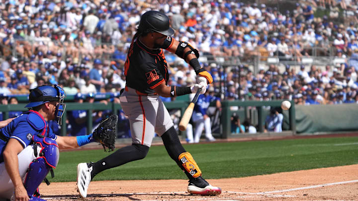 Mar 1, 2025; Phoenix, Arizona, USA; San Francisco Giants outfielder Luis Matos (29) bats against the Los Angeles Dodgers during the third inning at Camelback Ranch-Glendale.