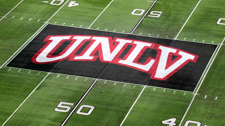 The UNLV Rebels logo at midfield during the Mountain West Championship at Allegiant Stadium. Mandatory Credit: Kirby Lee-Imagn Images