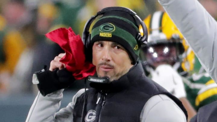 Green Bay Packers coach Matt LaFleur contemplates challenging a call during the 2021 playoff loss to the 49ers at Lambeau.