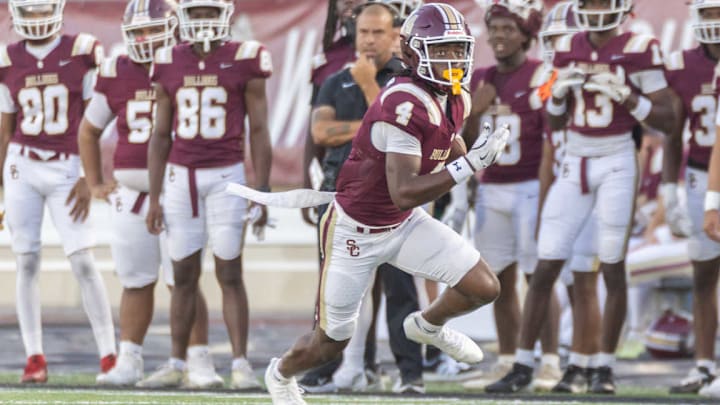 Humble Summer Creek's Benny Easter Jr. runs after a catch against Houston Lamar on Sept. 5. 