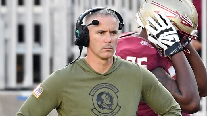 Nov 2, 2024; Tallahassee, Florida, USA; Florida State Seminoles head coach Mike Norvell looks on from the sideline after the North Carolina Tarheels score a final touchdown in the fourth quarter at Doak S. Campbell Stadium. Mandatory Credit: Robert Myers-Imagn Images