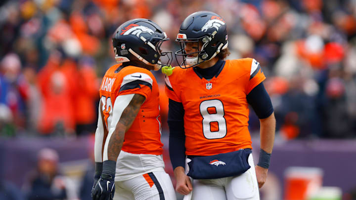 Jarrett Stidham celebrates after throwing a touchdown against the Patriots.