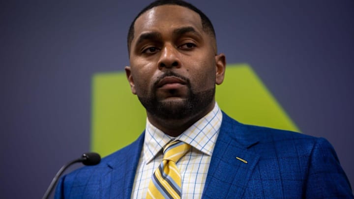 Sherrone Moore, Michigan        s new head coach, speaks in front of family, media and University of