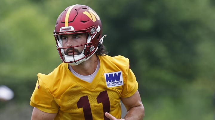 Jun 5, 2024; Ashburn, VA, USA; Washington Commanders quarterback Sam Hartman (11) prepares to pass the ball during OTA workouts at Commanders Park. Mandatory Credit: Geoff Burke-USA TODAY Sports Jun 5, 2024; Ashburn, VA, USA; Washington Commanders quarterback Sam Hartman (11) prepares to pass the ball during OTA workouts at Commanders Park. Mandatory Credit: Geoff Burke-USA TODAY Sports