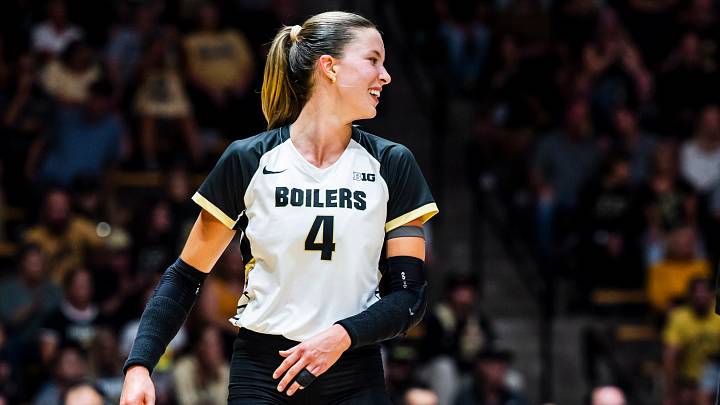 Kenna Wollard smiles during a Purdue volleyball match. Kenna Wollard smiles during a Purdue volleyball match.