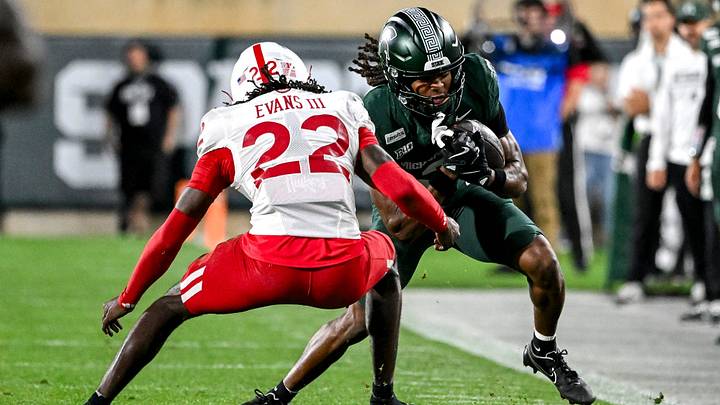 Rodney Bullard Jr. runs after a catch as Nebraska’s Victor Evans III closes in. Rodney Bullard Jr. runs after a catch as Nebraska’s Victor Evans III closes in.