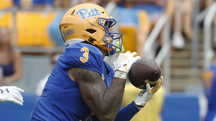 Aug 31, 2024; Pittsburgh, Pennsylvania, USA;  Pittsburgh Panthers defensive back Donovan McMillon (3) intercepts a Kent State Golden Flashes pass during the second quarter at Acrisure Stadium. Mandatory Credit: Charles LeClaire-Imagn Images