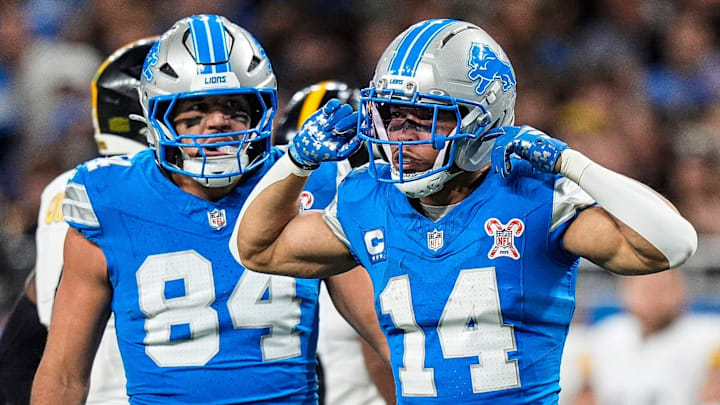 Detroit Lions wide receiver Amon-Ra St. Brown (14) celebrates a first down against Pittsburgh Steelers during the first half at Ford Field in Detroit on Sunday, Dec. 21, 2025.