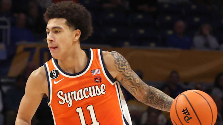 Jan 10, 2026; Pittsburgh, Pennsylvania, USA; Syracuse Orange guard Naithan George (11) dribbles the ball against the Pittsburgh Panthers during the first half at the Petersen Events Center. Mandatory Credit: Charles LeClaire-Imagn Images