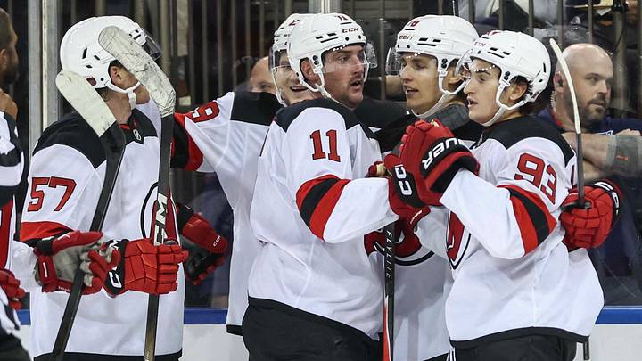 New Jersey Devils forward Amadeus Lombardi (93) celebrates with his teammates after scoring a goal in the third period against the New York Rangers at Madison Square Garden.  Mandatory Credit: Wendell Cruz-Imagn Images
