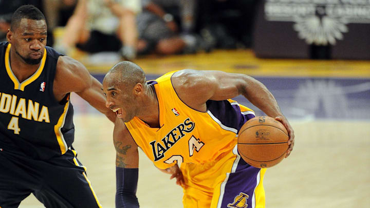 November 27, 2012; Los Angeles, CA, USA; Los Angeles Lakers shooting guard Kobe Bryant (24) drives to the basket past Indiana Pacers small forward Sam Young (4) at the Staples Center. Bryant scored 40 points in the game. Mandatory Credit: Jayne Kamin-Oncea-Imagn Images November 27, 2012; Los Angeles, CA, USA; Los Angeles Lakers shooting guard Kobe Bryant (24) drives to the basket past Indiana Pacers small forward Sam Young (4) at the Staples Center. Bryant scored 40 points in the game. Mandatory Credit: Jayne Kamin-Oncea-Imagn Images