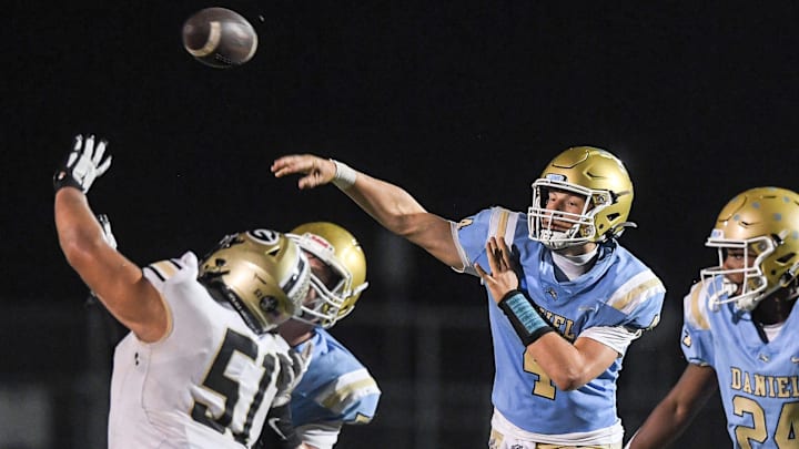 D.W. Daniel High School sophomore Grayson Clary (4) passes against Greer High during the fourth quarter at DW Daniel High School in Central, S.C. Friday, November 1, 2024. D.W. Daniel High School sophomore Grayson Clary (4) passes against Greer High during the fourth quarter at DW Daniel High School in Central, S.C. Friday, November 1, 2024.