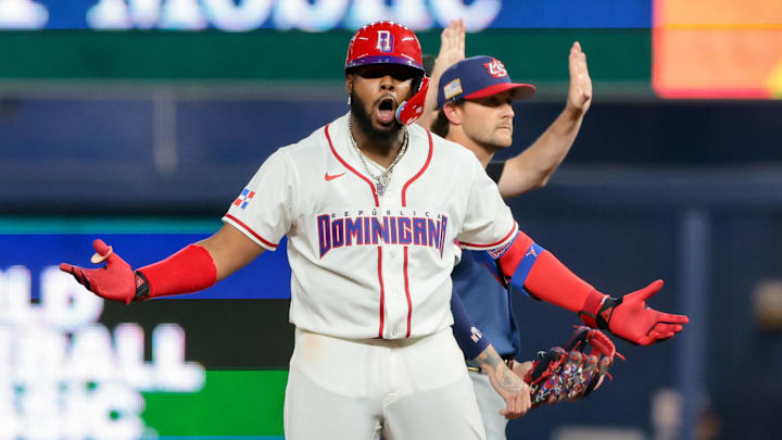 Mar 15, 2026; Miami, FL, United States; Dominican Republic first baseman Vladimir Guerrero Jr. (27) celebrates after hitting a double in the fourth inning against the United States during a semifinal game of the 2026 World Baseball Classic at loanDepot Park. 