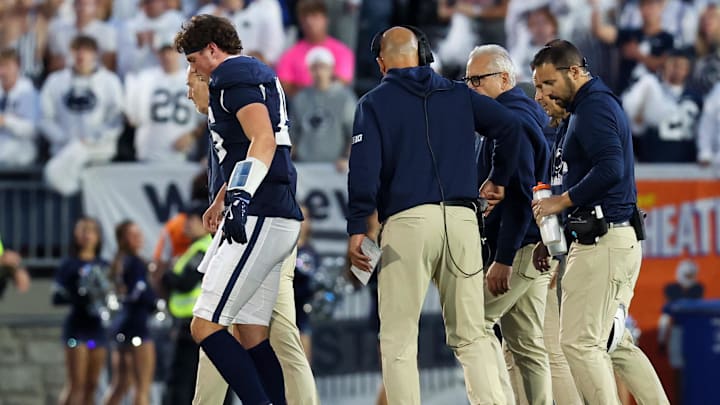 Penn State Nittany Lions quarterback Drew Allar walks off the field following an injury during the fourth quarter against the Northwestern Wildcats at Beaver Stadium. Penn State Nittany Lions quarterback Drew Allar walks off the field following an injury during the fourth quarter against the Northwestern Wildcats at Beaver Stadium.