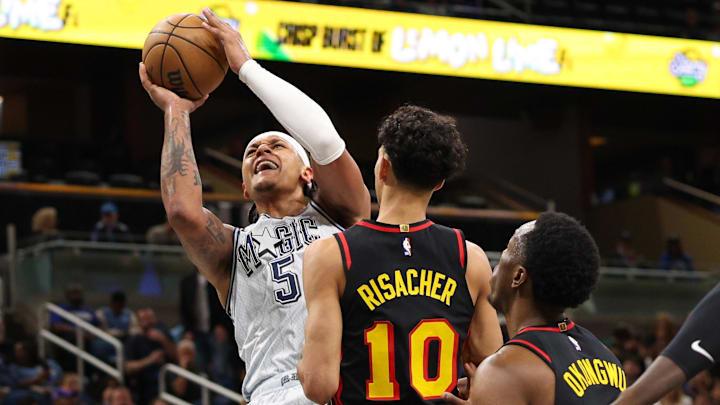Feb 10, 2025; Orlando, Florida, USA; Orlando Magic forward Paolo Banchero (5) shoots the ball against the Atlanta Hawks in the third quarter at Kia Center. Mandatory Credit: Nathan Ray Seebeck-Imagn Images