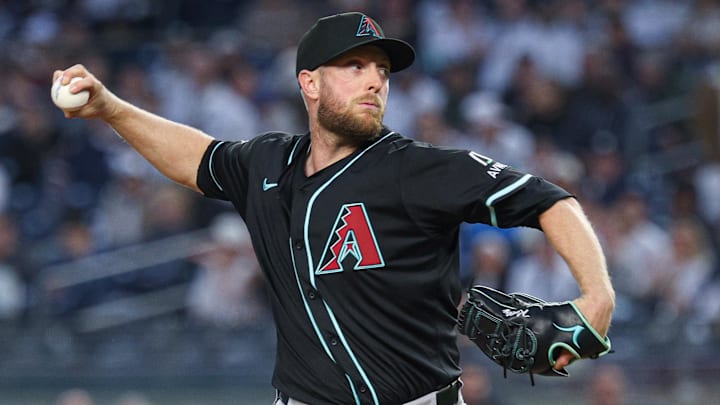 Apr 3, 2025; Bronx, New York, USA; Arizona Diamondbacks starting pitcher Merrill Kelly (29) delivers a pitch during the first inning against the New York Yankees at Yankee Stadium. Mandatory Credit: Vincent Carchietta-Imagn Images Apr 3, 2025; Bronx, New York, USA; Arizona Diamondbacks starting pitcher Merrill Kelly (29) delivers a pitch during the first inning against the New York Yankees at Yankee Stadium. Mandatory Credit: Vincent Carchietta-Imagn Images