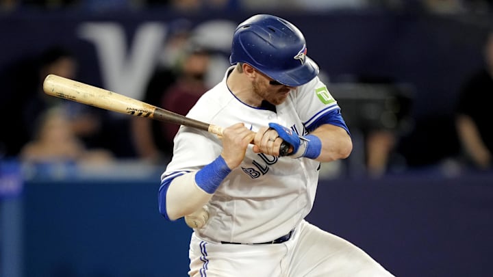 Aug 2, 2023; Toronto, Ontario, CAN; Toronto Blue Jays catcher Danny Jansen (9) is hit by a pitch