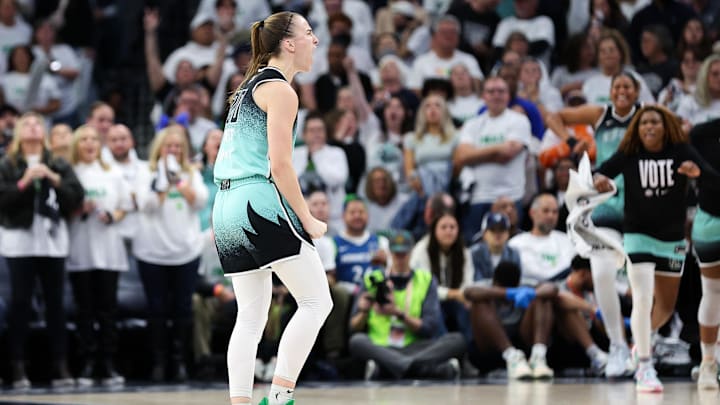 Oct 16, 2024; Minneapolis, Minnesota, USA; New York Liberty guard Sabrina Ionescu (20) celebrates her 3-point basket against the Minnesota Lynx during the second half of game three of the 2024 WNBA Finals at Target Center. Mandatory Credit: Matt Krohn-Imagn Images Oct 16, 2024; Minneapolis, Minnesota, USA; New York Liberty guard Sabrina Ionescu (20) celebrates her 3-point basket against the Minnesota Lynx during the second half of game three of the 2024 WNBA Finals at Target Center. Mandatory Credit: Matt Krohn-Imagn Images