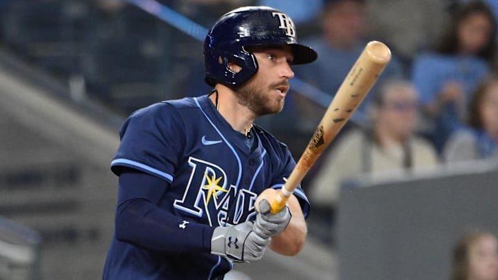 May 14, 2025; Toronto, Ontario, CAN;  Tampa Bay Rays second baseman Brandon Lowe (8) hits a single against the Toronto Blue Jays in the fifth inning at Rogers Centre. Mandatory Credit: Dan Hamilton-Imagn Images