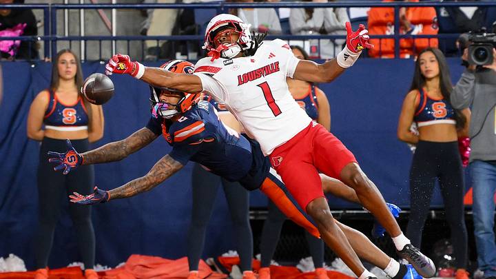Oct 17, 2026; Syracuse, New York, USA; Louisville Cardinals cornerback Jabari Mack (1) breaks up a pass intended for Syracuse Orange wide receiver Umari Hatcher (2) during the second half at the JMA Wireless Dome. Mandatory Credit: Rich Barnes-Imagn Images Oct 17, 2026; Syracuse, New York, USA; Louisville Cardinals cornerback Jabari Mack (1) breaks up a pass intended for Syracuse Orange wide receiver Umari Hatcher (2) during the second half at the JMA Wireless Dome. Mandatory Credit: Rich Barnes-Imagn Images