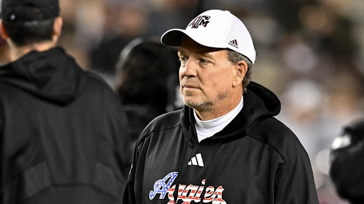 Nov 11, 2023; College Station, Texas, USA; Texas A&M Aggies head coach Jimbo Fisher looks on during warm ups prior to the game against the Mississippi State Bulldogs at Kyle Field. Mandatory Credit: Maria Lysaker-Imagn Images
