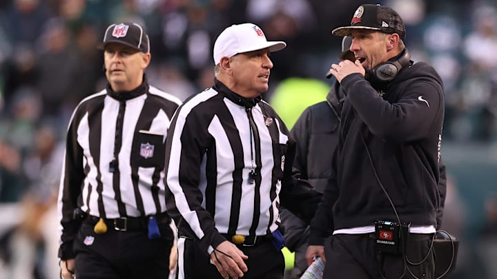 San Francisco 49ers head coach Kyle Shanahan argues with NFL referee John Hussey