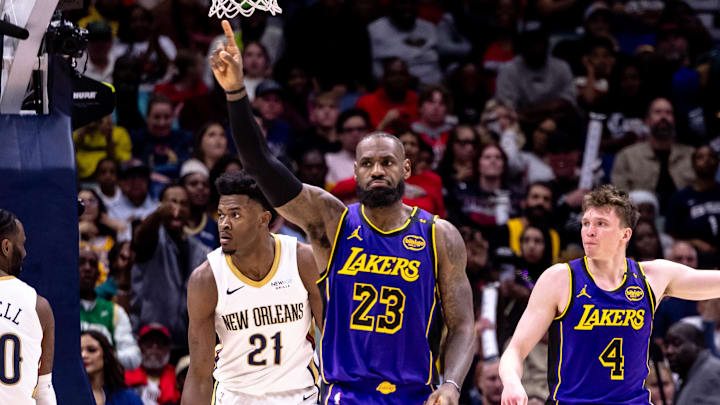 Nov 16, 2024; New Orleans, Louisiana, USA;  Los Angeles Lakers forward LeBron James (23) signals no basket against the New Orleans Pelicans during the second half at Smoothie King Center. Mandatory Credit: Stephen Lew-Imagn Images