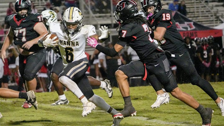T.L. Hanna High  runs near Hillcrest High during the fourth quarter at Hillcrest High School in Simpsonville, S.C. Friday, October 3, 2025.