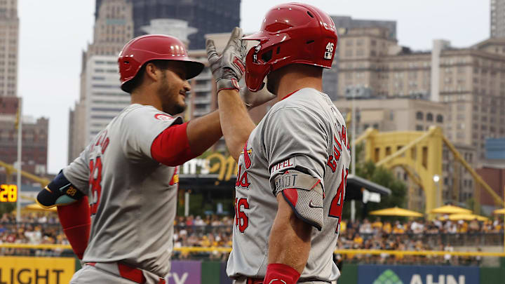 Jul 23, 2024; Pittsburgh, Pennsylvania, USA;  St. Louis Cardinals first baseman Paul Goldschmidt (46)  congratulates third baseman Nolan Arenado (left) on his solo home run against the Pittsburgh Pirates during the fifth inning at PNC Park. Mandatory Credit: Charles LeClaire-Imagn Images