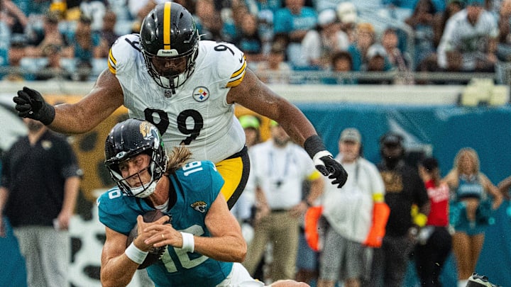 Pittsburgh Steelers cornerback Darius Slay (23) brings down Jacksonville Jaguars quarterback Trevor Lawrence (16) during the first half of the first preseason game where the Jacksonville Jaguars hosted the Pittsburgh Steelers Saturday Aug. 9, 2025, at EverBank Stadium in Jacksonville, Fla. [Doug Engle/Florida Times-Union]