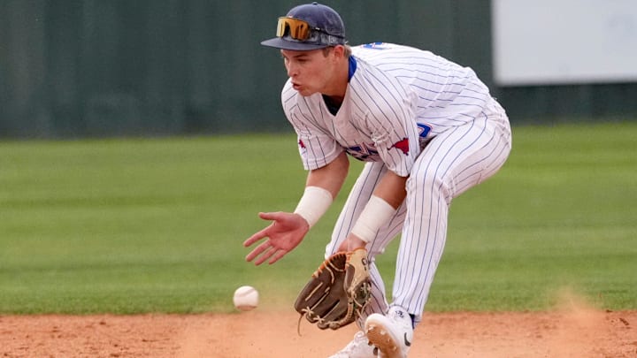 Fort Cobb-Broxton's Eli Willits fields a grounder during the high school baseball game between Fort Cobb-Broxton and Stillwater at Edmond Santa Fe High School in Edmond, Okla., Friday, April, 18, 2025.