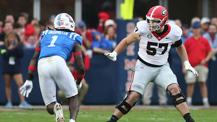 Nov 9, 2024; Oxford, Mississippi, USA; Georgia Bulldogs offensive lineman Monroe Freeling (57) blocks Mississippi Rebels defensive lineman Princely Umanmielen (1) during the first half at Vaught-Hemingway Stadium. Mandatory Credit: Petre Thomas-Imagn Images