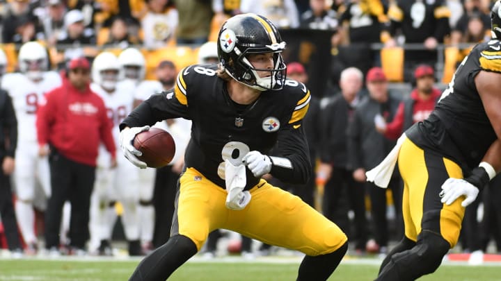 Dec 3, 2023; Pittsburgh, Pennsylvania, USA;  Pittsburgh Steelers quarterback Kenny Pickett (8) plays the ball against the Arizona Cardinals during the second quarter at Acrisure Stadium. Mandatory Credit: Philip G. Pavely-USA TODAY Sports