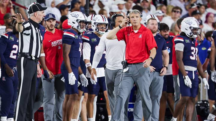 Oct 3, 2026; Tucson, Arizona, USA; Arizona Wildcats head coach Brent Brennan watches during the second quarter of the game against the Cincinnati Bearcats at Casino Del Sol Stadium. Oct 3, 2026; Tucson, Arizona, USA; Arizona Wildcats head coach Brent Brennan watches during the second quarter of the game against the Cincinnati Bearcats at Casino Del Sol Stadium.