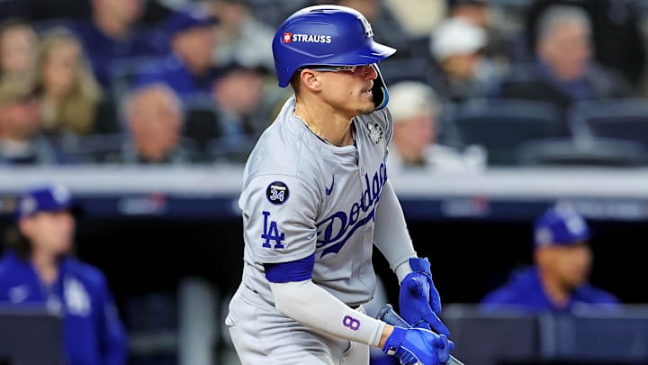 Oct 28, 2024; New York, New York, USA; Los Angeles Dodgers third baseman Enrique Hernandez (8) hits a an RBI single during the sixth inning against the New York Yankees in game three of the 2024 MLB World Series at Yankee Stadium