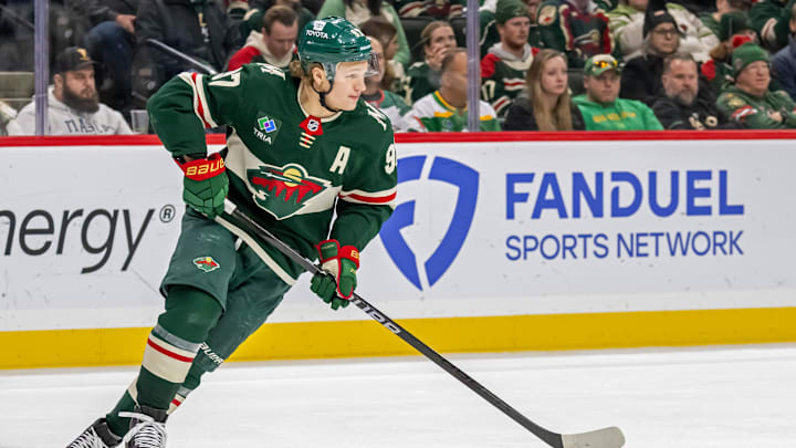 Dec 20, 2024; Saint Paul, Minnesota, USA;  Minnesota Wild forward Kirill Kaprizov (97) turns up ice against the Utah Hockey Club during the third period at Xcel Energy Center. Mandatory Credit: Nick Wosika-Imagn Images