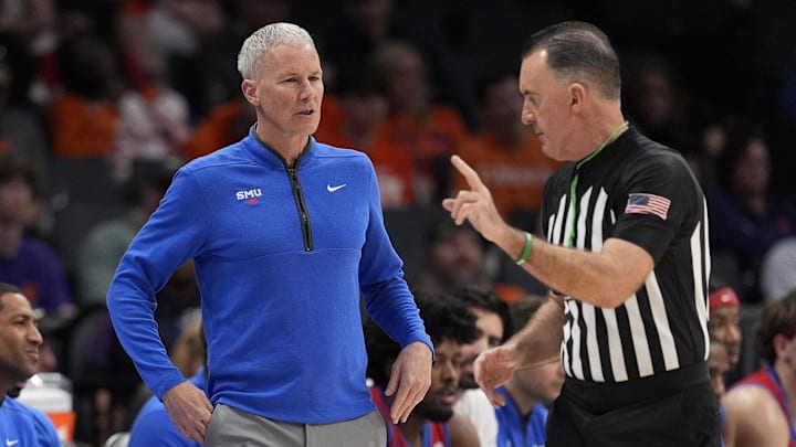 Mar 13, 2025; Charlotte, NC, USA; Southern Methodist Mustangs head coach Andy Enfield during the first half against the Clemson Tigers at Spectrum Center. Mandatory Credit: Jim Dedmon-Imagn Images