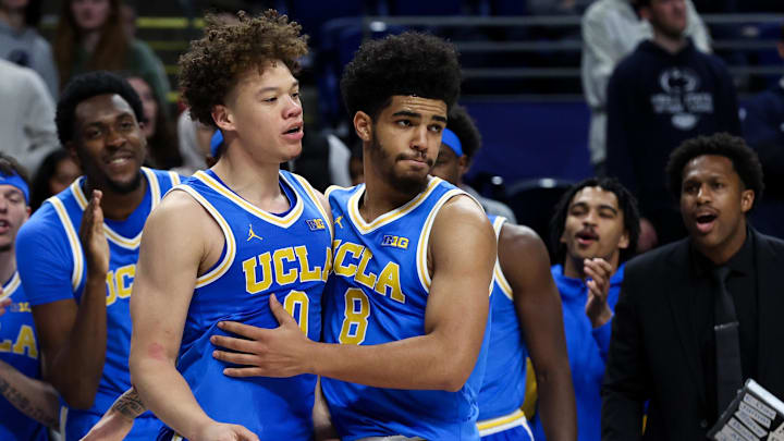 Jan 14, 2026; University Park, Pennsylvania, USA; UCLA Bruins guard Trent Perry (0) is congratulated by guard Eric Freeny (8) after scoring a basket during the second half against the Penn State Nittany Lions at Bryce Jordan Center. Mandatory Credit: Matthew O'Haren-Imagn Images