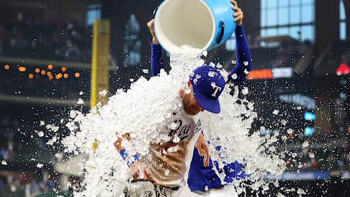 Robbie Grossman gets the first ice bath of 2023 for the Texas Rangers. 