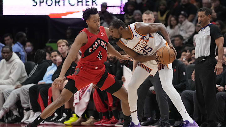 Nov 29, 2023; Toronto, Ontario, CAN; Toronto Raptors forward Scottie Barnes (4) defends against Phoenix Suns forward Kevin Durant (35) during the second half at Scotiabank Arena. Mandatory Credit: John E. Sokolowski-Imagn Images Nov 29, 2023; Toronto, Ontario, CAN; Toronto Raptors forward Scottie Barnes (4) defends against Phoenix Suns forward Kevin Durant (35) during the second half at Scotiabank Arena. Mandatory Credit: John E. Sokolowski-Imagn Images