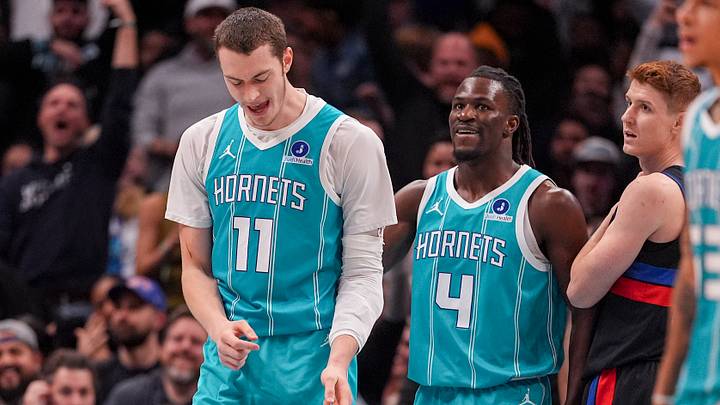 Feb 9, 2026; Charlotte, North Carolina, USA; Charlotte Hornets center Ryan Kalkbrenner (11) celebrates his dunk with guard Sion James (4) during the second half against the Detroit Pistons at Spectrum Center. Mandatory Credit: Jim Dedmon-Imagn Images Feb 9, 2026; Charlotte, North Carolina, USA; Charlotte Hornets center Ryan Kalkbrenner (11) celebrates his dunk with guard Sion James (4) during the second half against the Detroit Pistons at Spectrum Center. Mandatory Credit: Jim Dedmon-Imagn Images