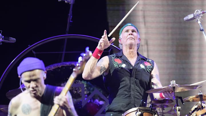 Drummer Chad Smith throws his sticks while performing with the Red Hot Chili Peppers on May 14, 2023, at State Farm Stadium in Glendale. Drummer Chad Smith throws his sticks while performing with the Red Hot Chili Peppers on May 14, 2023, at State Farm Stadium in Glendale.