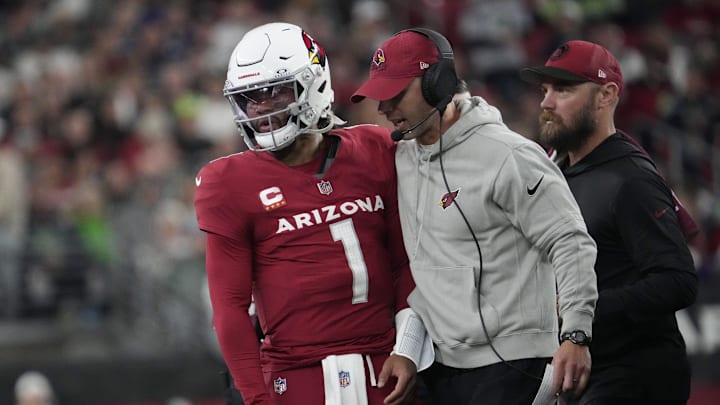 Arizona Cardinals head coach Jonathan Gannon talks with quarterback Kyler Murray.
