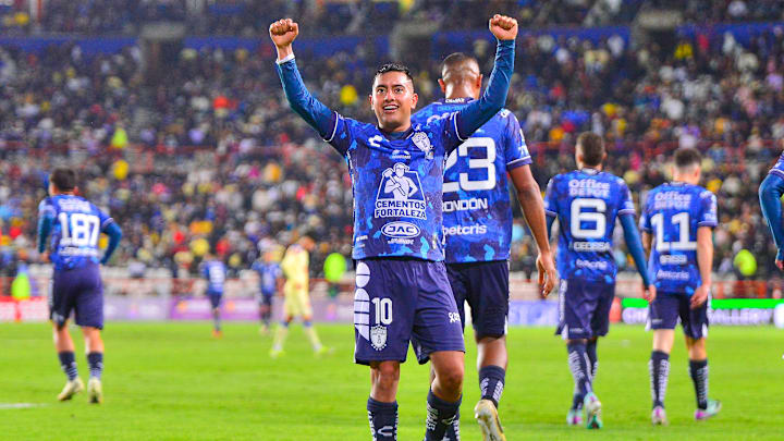 Erick Sánchez gestures to the stands after scoring for Pachuca against América. The Tuzos defeated the defending Liga MX champs 2-1.