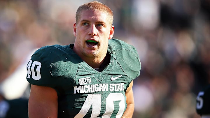 November 17, 2012; East Lansing, MI, USA; Michigan State Spartans linebacker Max Bullough (40) walks off the field after a game against the Northwestern Wildcats at Spartan Stadium.   Mandatory Credit: Mike Carter-Imagn Images