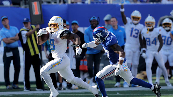 Chargers running back Omarion Hampton (8) runs for a touchdown against the Giants in Week 4.